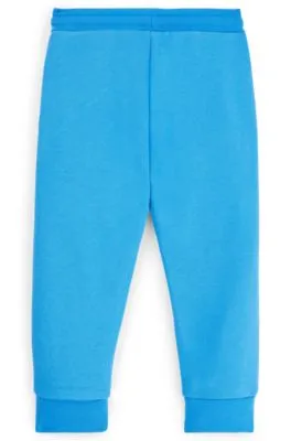 Kids' tracksuit bottoms with vertical logo