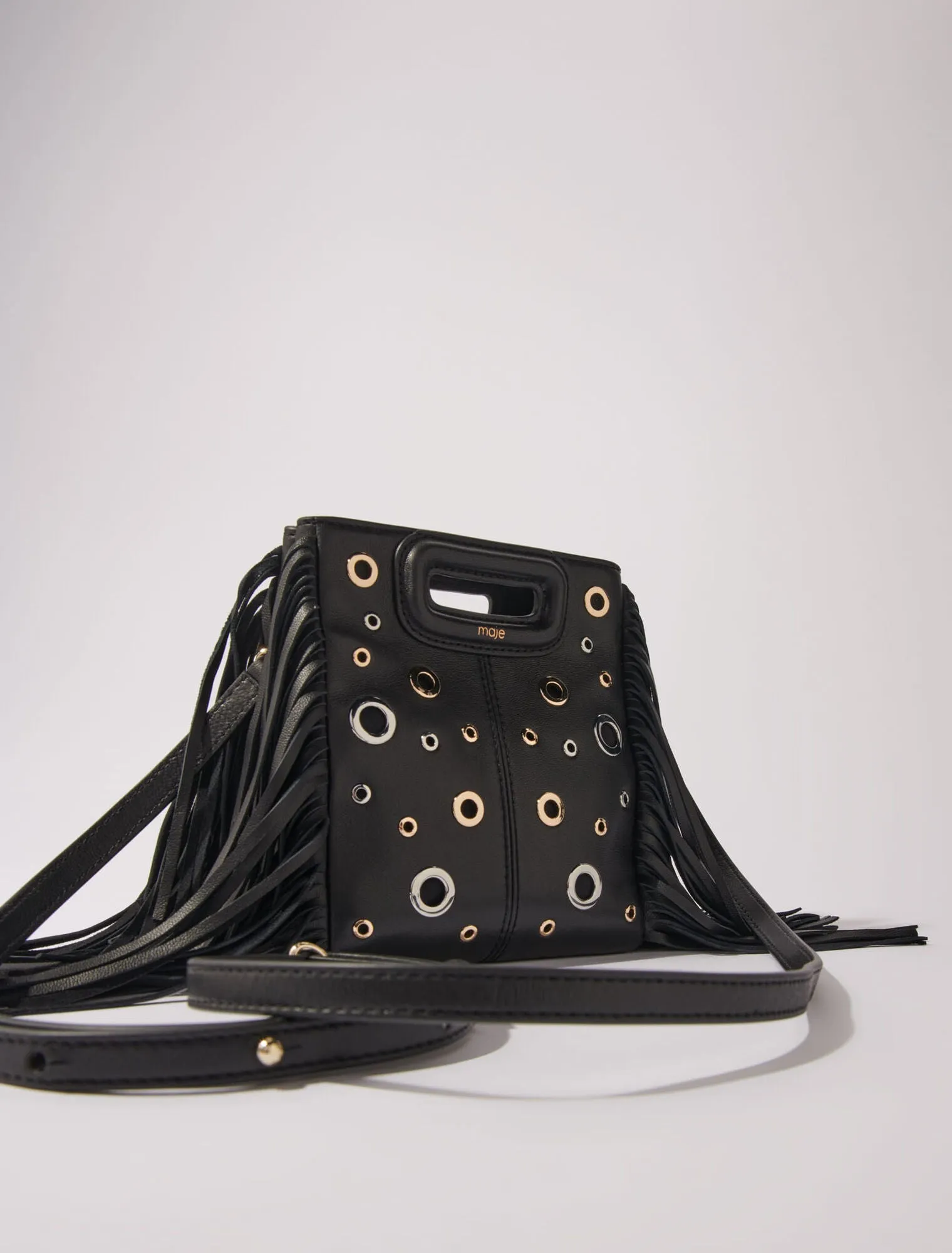 Leather M mini bag with eyelets